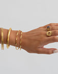 Juniper - Wavy Twisted Bangle Bracelet Stainless Steel bakfra, tilbehør fra Timi Of Sweden hos Image Mandal