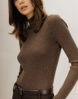 mari turtleneck